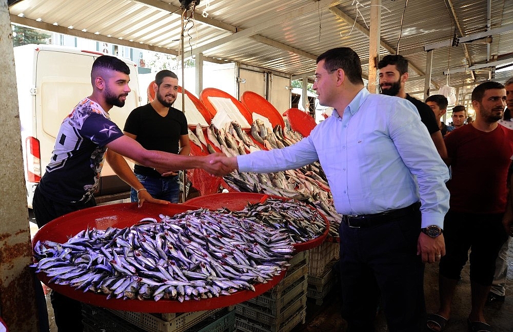 Tütüncü, pazar esnafıyla buluştu
